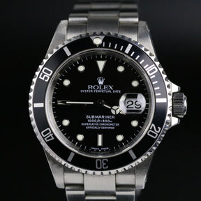 2000 Rolex 16610 Submariner Holes Case SEL with Box & Papers