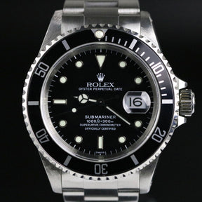 1999 Rolex 16610 Submariner with Box & Paper