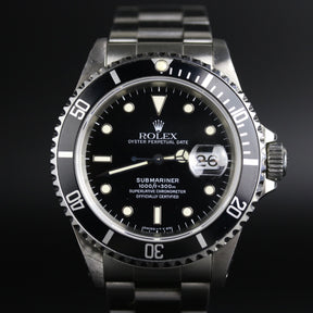 1996 Rolex 16610 Submariner with Box & Papers