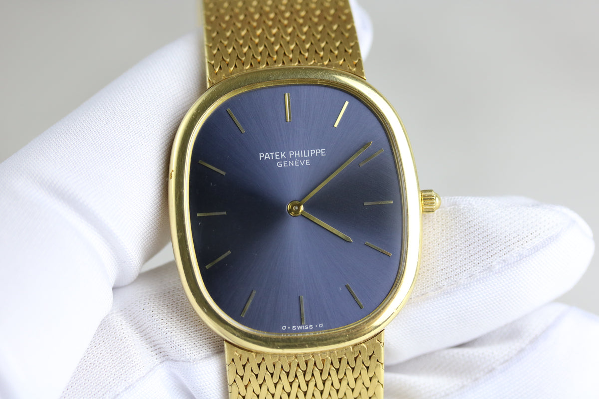 1970s Patek Philippe 3738/100J Golden Ellipse 18K Yellow Gold Blue Dial