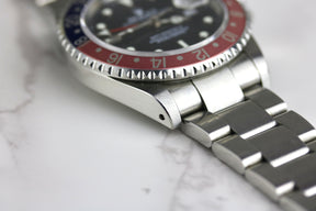 2002 Rolex 16710 GMT-MASTER II Pepsi with Box & Papers