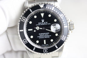 2001 Rolex 16610 Submariner Holes Case SEL with Box & Papers