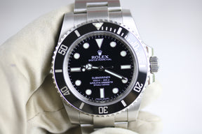 2012 ROLEX 114060 No-Date Submariner with Box & Papers