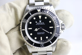 1997 ROLEX 14060 No-Date Submariner with Box & Papers