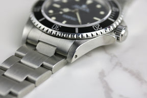 1997 ROLEX 14060 No-Date Submariner with Box & Papers