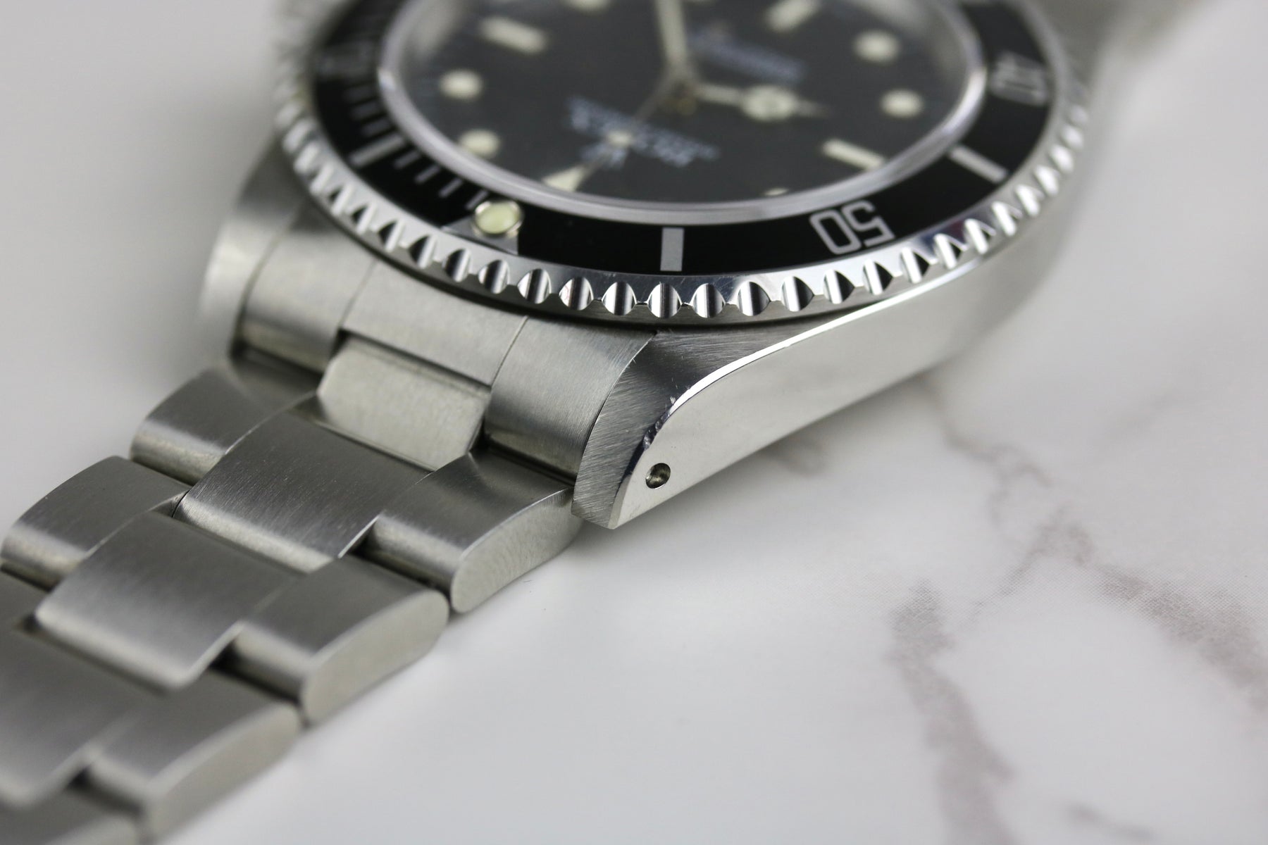 1997 ROLEX 14060 No-Date Submariner with Box & Papers